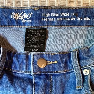 High rise wide leg lightweight jeans. Hemmed inseam measures 28 inches